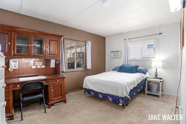 816 Malta St NE, Grand Rapids, MI 49503 - bedroom featuring multiple windows, light colored carpet, and a wall mounted AC