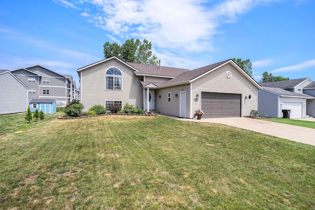 13757 Duncan St, Holland, MI 49424 - split level home with an attached garage, driveway, and a front lawn