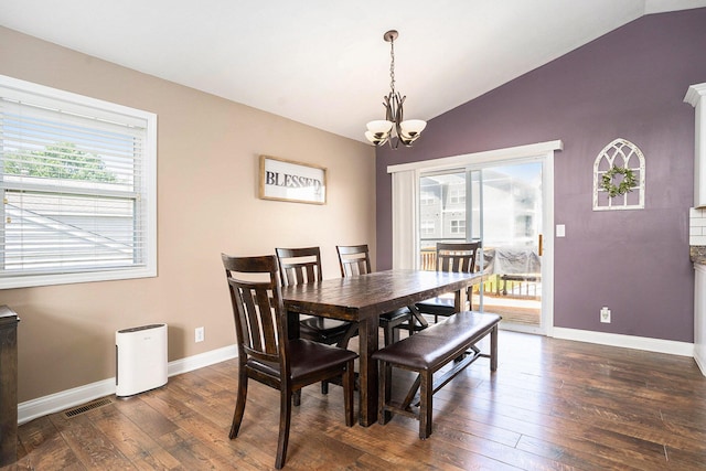 13757 Duncan St, Holland, MI 49424 - dining area featuring lofted ceiling, a chandelier, and dark wood-style flooring