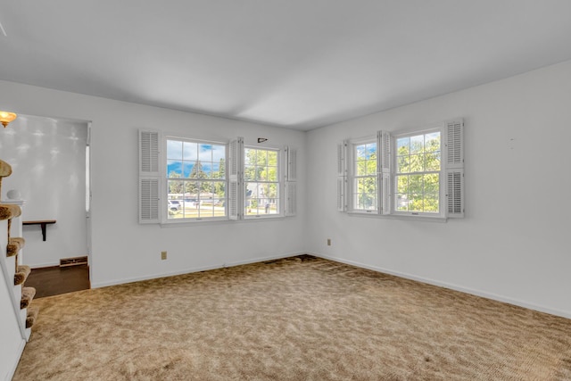 1007 Oak Grove Rd, Jackson, MI 49203 - empty room featuring carpet flooring and baseboards