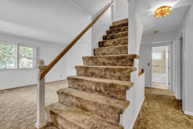 1007 Oak Grove Rd, Jackson, MI 49203 - staircase with carpet and baseboards