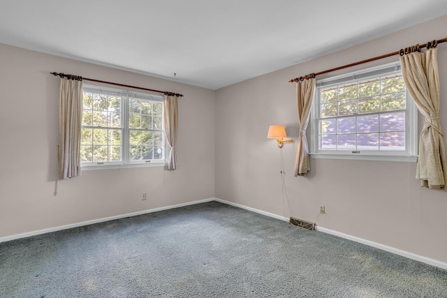 1007 Oak Grove Rd, Jackson, MI 49203 - unfurnished room with carpet flooring and baseboards