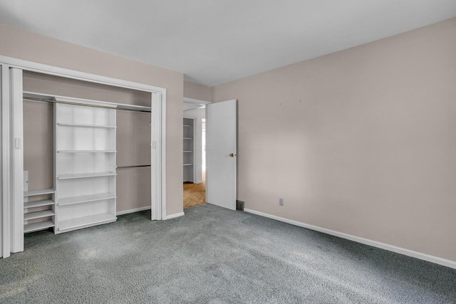 1007 Oak Grove Rd, Jackson, MI 49203 - unfurnished bedroom featuring carpet floors and a closet