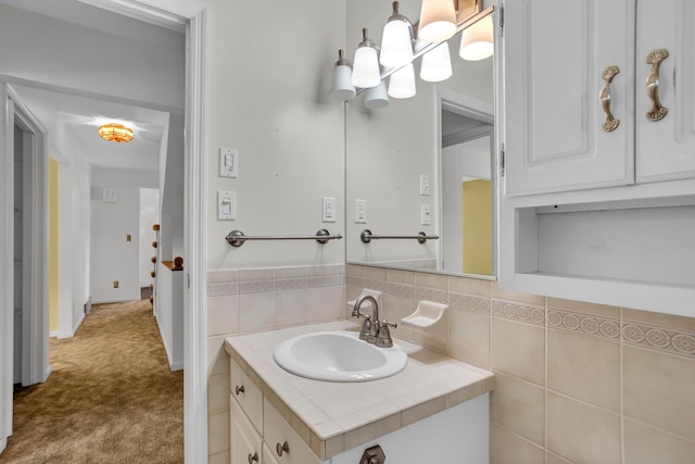 1007 Oak Grove Rd, Jackson, MI 49203 - bathroom featuring vanity and a chandelier