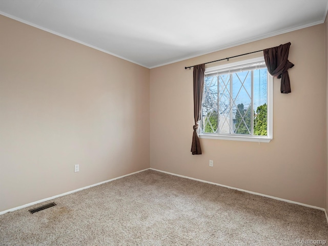 29272 Gloede Dr Unit 16, Warren, MI 48088 - spare room featuring ornamental molding and carpet flooring