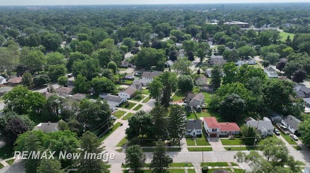 508 Malzahn St, Saginaw, MI 48602 - aerial view of property and surrounding area with nearby suburban area and a forest