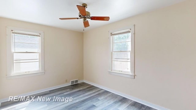 508 Malzahn St, Saginaw, MI 48602 - spare room featuring wood finished floors and a ceiling fan