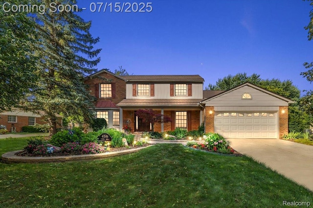 4516 Cahill Dr, Troy, MI 48098 - traditional-style home featuring an attached garage, driveway, a front yard, brick siding, and a porch