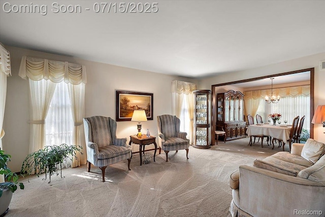 4516 Cahill Dr, Troy, MI 48098 - carpeted living area with a chandelier and plenty of natural light