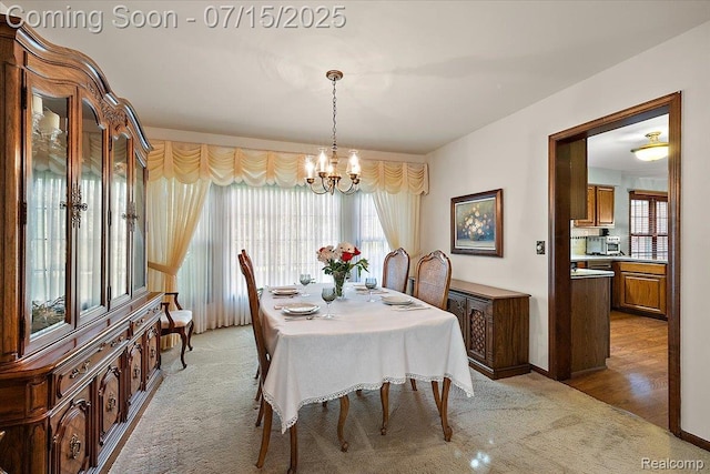 4516 Cahill Dr, Troy, MI 48098 - dining room with a chandelier, plenty of natural light, and light carpet
