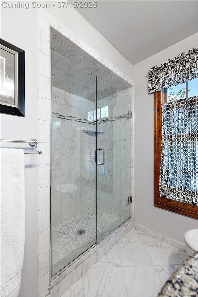 4516 Cahill Dr, Troy, MI 48098 - bathroom with a stall shower and marble finish floors