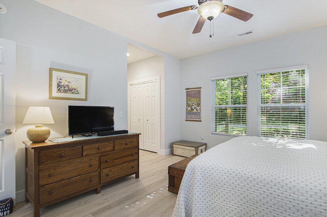 488 Solace Way S, Haven, MI 49090 - bedroom featuring light wood-type flooring, a closet, a ceiling fan, and recessed lighting