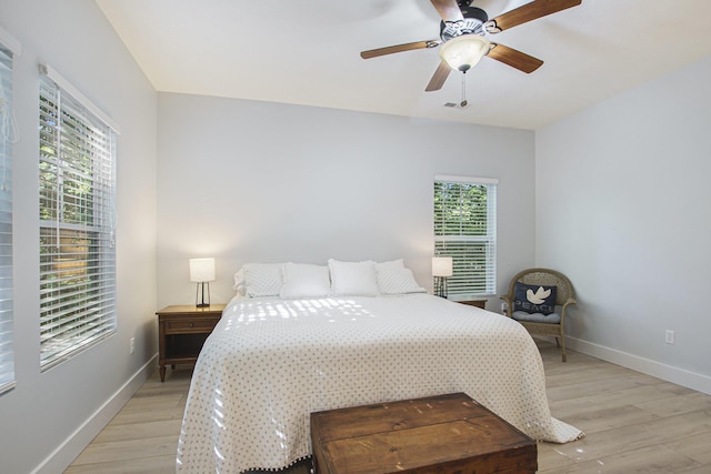 488 Solace Way S, Haven, MI 49090 - bedroom with light wood-type flooring and a ceiling fan