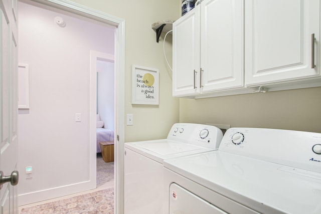 488 Solace Way S, Haven, MI 49090 - laundry room featuring separate washer and dryer and cabinet space