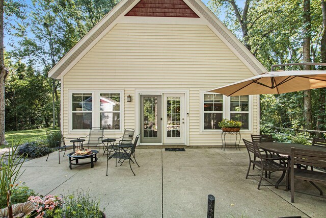 488 Solace Way S, Haven, MI 49090 - view of patio featuring an outdoor fire pit and outdoor dining area