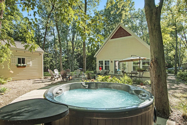 488 Solace Way S, Haven, MI 49090 - view of swimming pool featuring a hot tub and a patio area