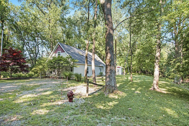 488 Solace Way S, Haven, MI 49090 - view of grassy yard featuring an outbuilding