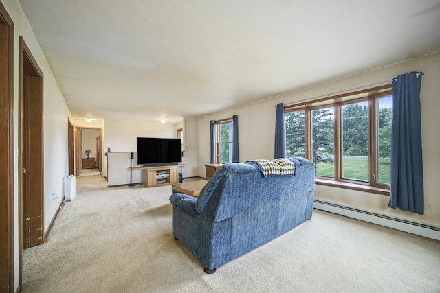 131 E Ave, Jackson, MI 49201 - living room featuring baseboard heating and light colored carpet