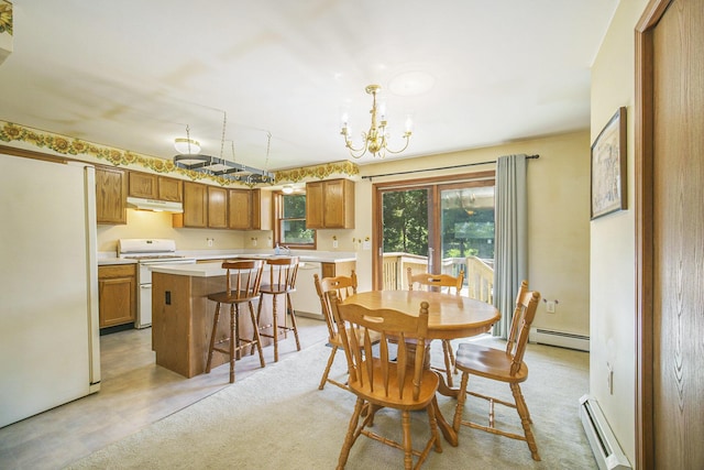 131 E Ave, Jackson, MI 49201 - dining space with a baseboard radiator and a chandelier