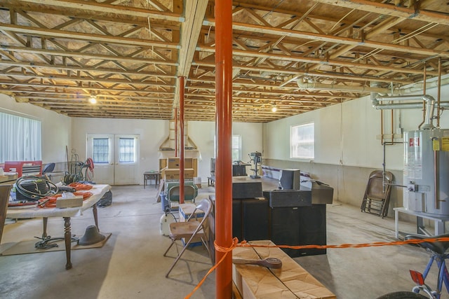 131 E Ave, Jackson, MI 49201 - basement featuring water heater and french doors