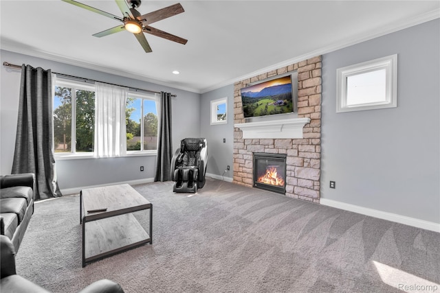 343 Hidden Riv E, Holly, MI 48442 - carpeted living area with ornamental molding, ceiling fan, a stone fireplace, and recessed lighting