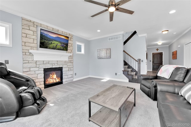 343 Hidden Riv E, Holly, MI 48442 - carpeted living area featuring ceiling fan, ornamental molding, stairs, a fireplace, and recessed lighting