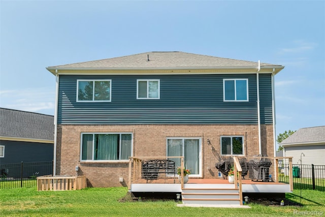 343 Hidden Riv E, Holly, MI 48442 - back of house with a deck and brick siding