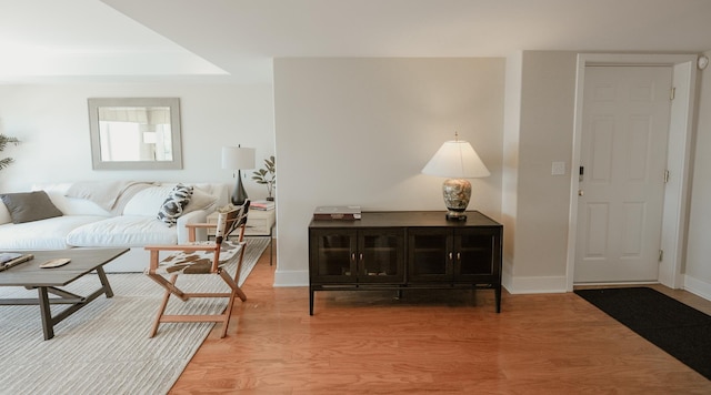 706 N Dockside Cir, Suttons Bay, MI 49682 - living room featuring wood finished floors and baseboards