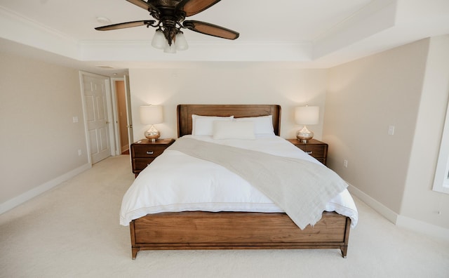 706 N Dockside Cir, Suttons Bay, MI 49682 - bedroom with a raised ceiling, ornamental molding, light colored carpet, and a ceiling fan