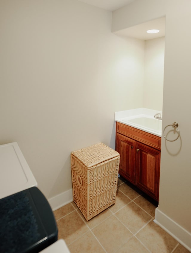 706 N Dockside Cir, Suttons Bay, MI 49682 - bathroom featuring vanity and tile patterned floors