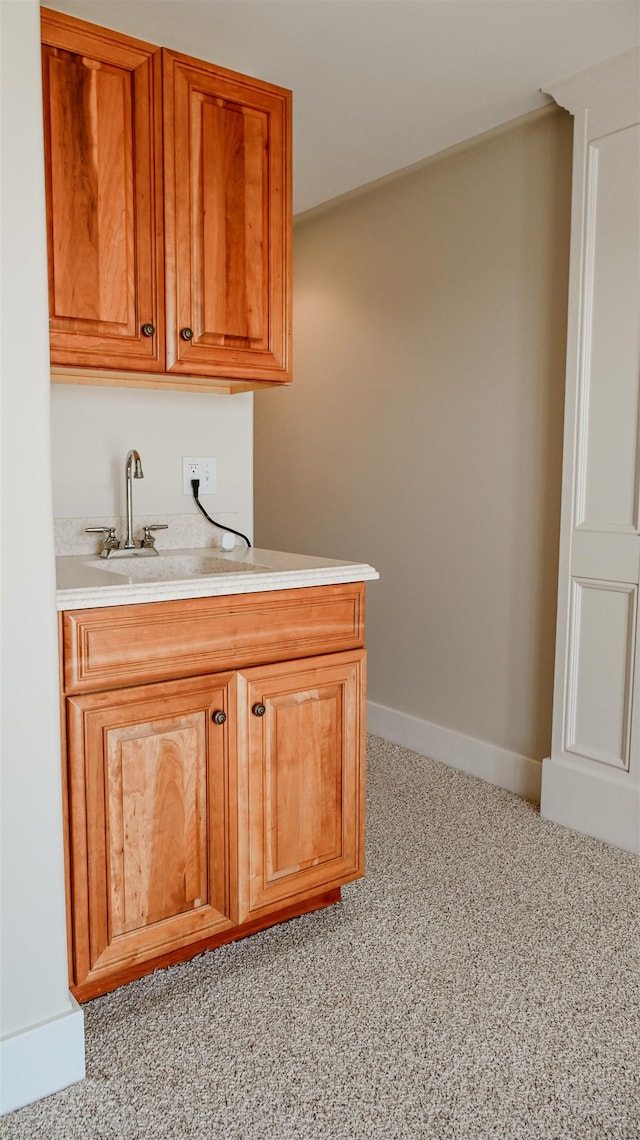 706 N Dockside Cir, Suttons Bay, MI 49682 - indoor wet bar with baseboards and light colored carpet