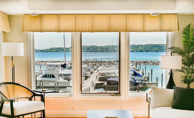 706 N Dockside Cir, Suttons Bay, MI 49682 - interior space featuring a water view and healthy amount of natural light