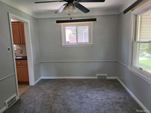 19351 Braile St, Detroit, MI 48219 - empty room with light carpet and a ceiling fan