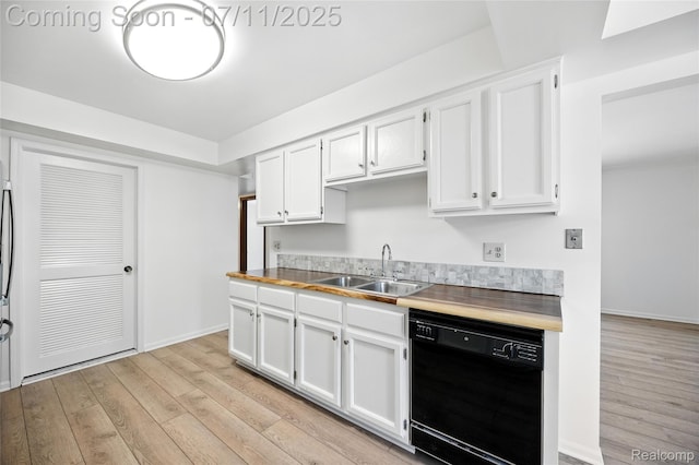 276 Meadow Bridge Dr, Rochester Hills, MI 48307 - kitchen featuring black dishwasher, light wood-type flooring, and white cabinets
