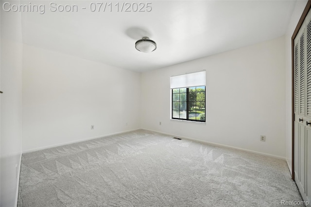 276 Meadow Bridge Dr, Rochester Hills, MI 48307 - unfurnished bedroom featuring light carpet and a closet
