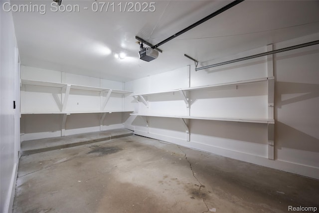 276 Meadow Bridge Dr, Rochester Hills, MI 48307 - garage with a garage door opener and baseboards