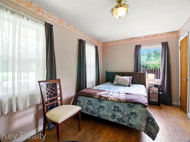 1225 S Annabelle St, Detroit, MI 48217 - bedroom with wood finished floors and baseboards