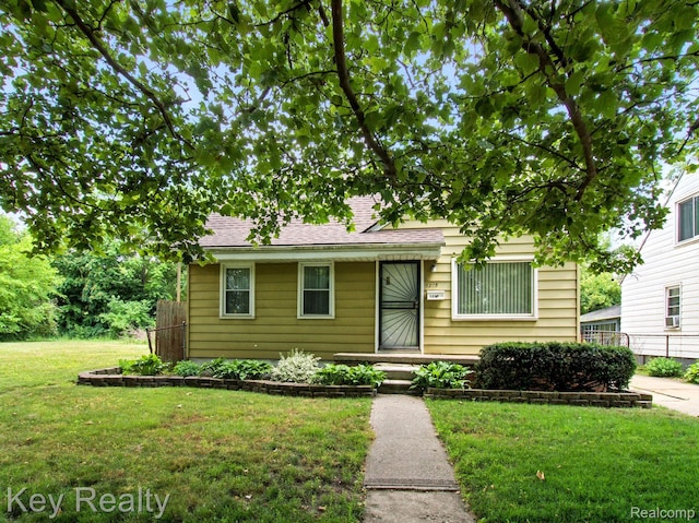 1225 S Annabelle St, Detroit, MI 48217 - view of front of home with roof with shingles