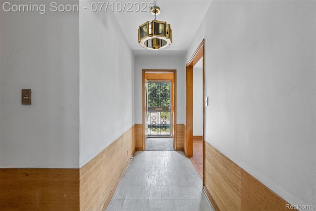 24280 Moritz St, Oak Park, MI 48237 - doorway featuring a wainscoted wall and wood finished floors