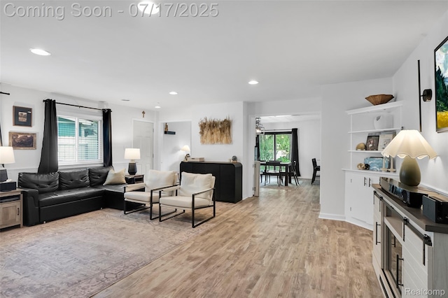 1890 Darwin Rd, Pinckney, MI 48169 - living room with healthy amount of natural light, light wood-style floors, and recessed lighting