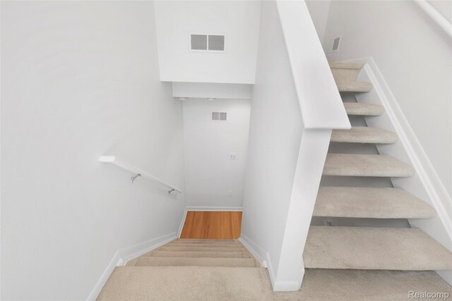 9671 Harbour Cove Ct, Ypsilanti, MI 48197 - stairs with baseboards and carpet floors