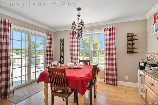 1090 E Jones Rd, Howell, MI 48855 - dining room with light wood-type flooring and crown molding