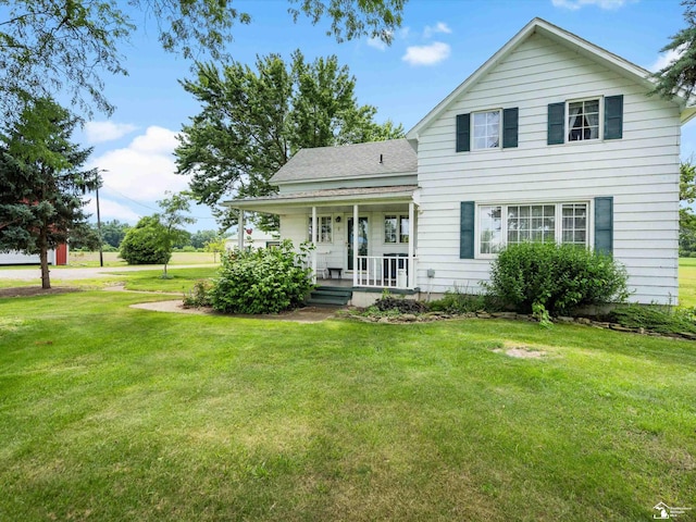 7393 Newport S Rd, Newport, MI 48166 - traditional-style home with covered porch and a front yard