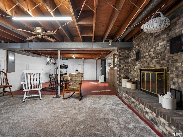 7393 Newport S Rd, Newport, MI 48166 - basement featuring electric panel, a fireplace, ceiling fan, and carpet floors