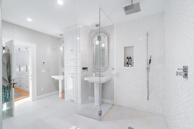 613 E Mitchell St, Petoskey, MI 49770 - bathroom with tiled shower and recessed lighting