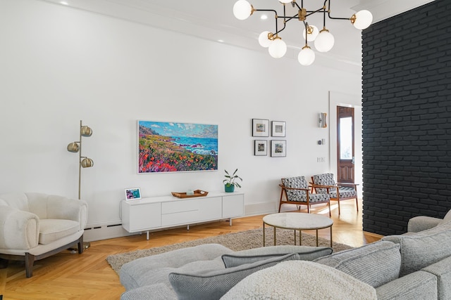 613 E Mitchell St, Petoskey, MI 49770 - living room with a chandelier, a baseboard heating unit, and recessed lighting