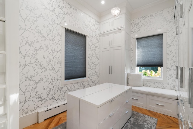 613 E Mitchell St, Petoskey, MI 49770 - bathroom with a baseboard radiator, wallpapered walls, and crown molding