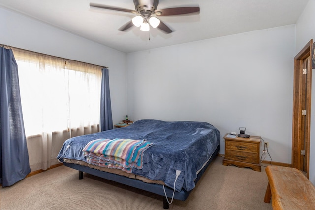 11105 Hahn Beach Dr, Evart, MI 49631 - bedroom with light carpet and a ceiling fan