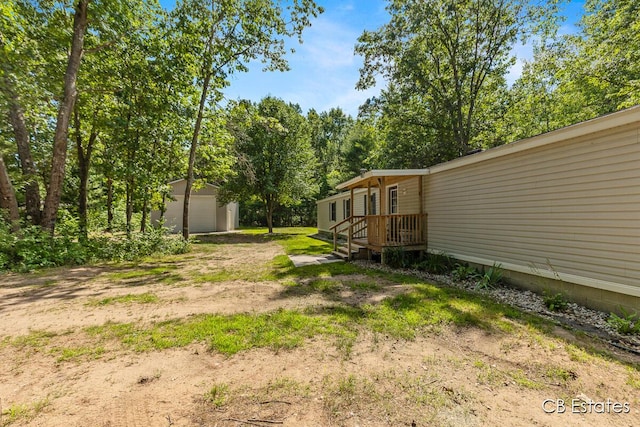 4301 Lasalle Ln, Newaygo, MI 49337 - view of yard featuring an outbuilding