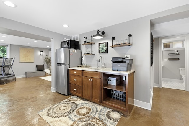 15178 154th Ave, Grand Haven, MI 49417 - kitchen with freestanding refrigerator, concrete flooring, open shelves, and recessed lighting